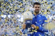 Novak Djokovic with the Rookwood Cup after winning the 2023 Cincinnati Open.